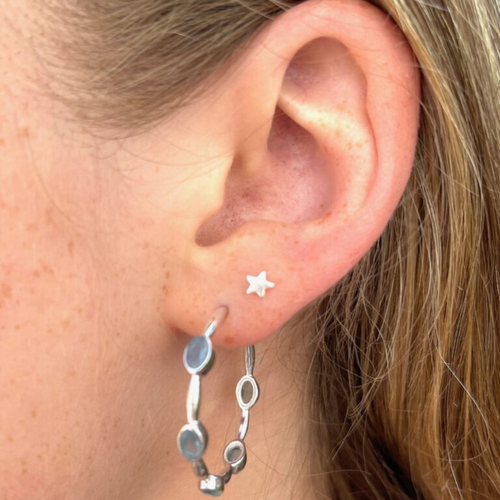 
                  
                    model wears Apatite gemstone silver hoops 
                  
                