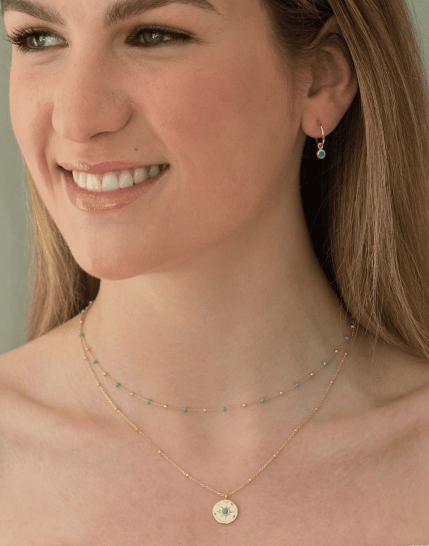 Astrid gold necklace layered with enamel necklace