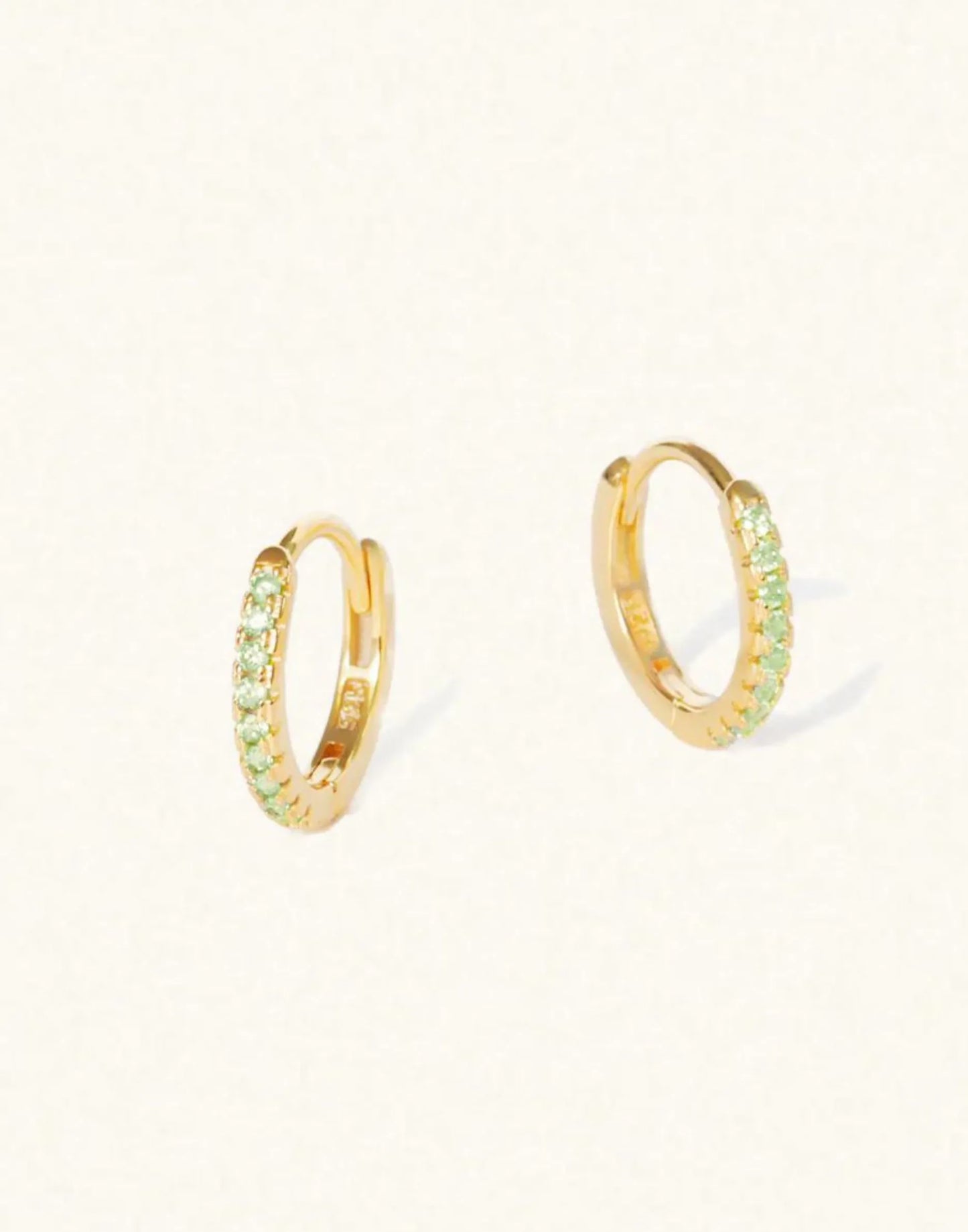 August peridot birthstone huggies