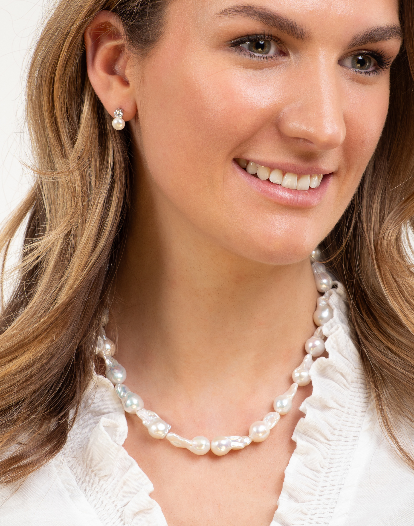 model wears baroque pearl necklace