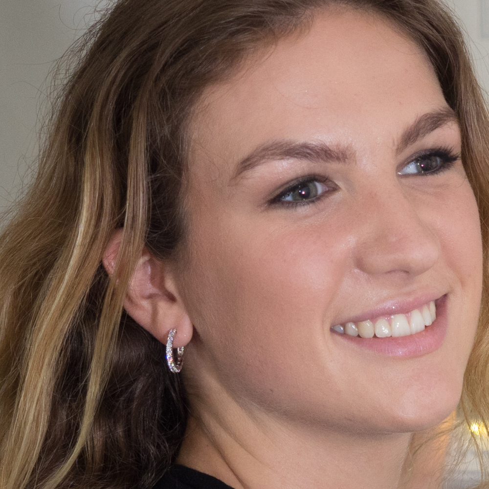 
                  
                    model wears sparkle hoop earrings
                  
                