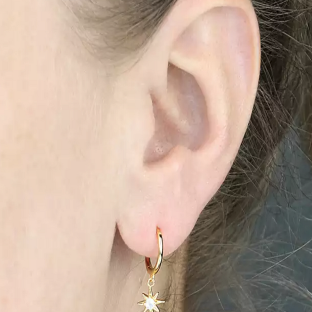 Gold-CZ-Star-Charm-Huggie-in-ear