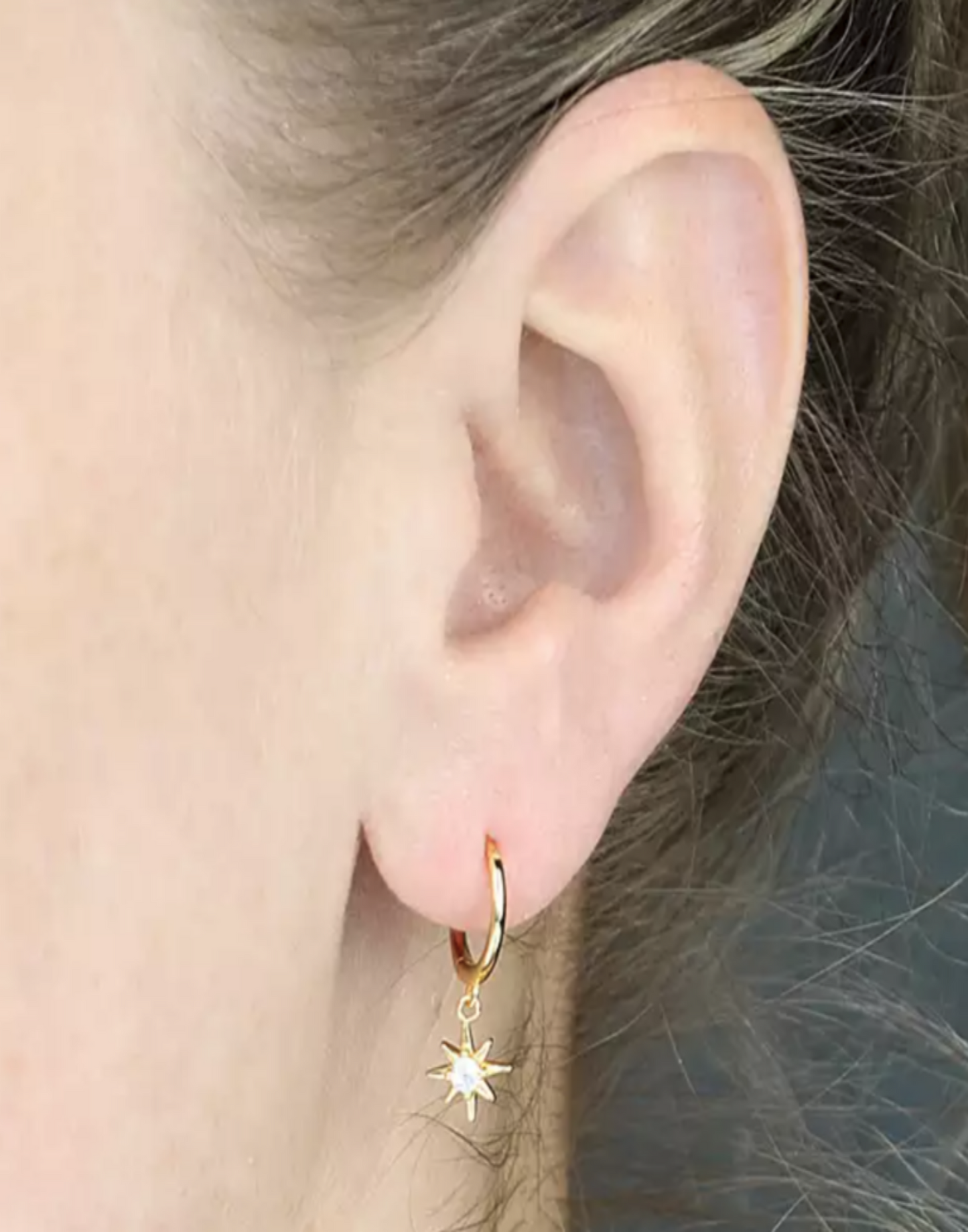 Gold-CZ-Star-Charm-Huggie-in-ear