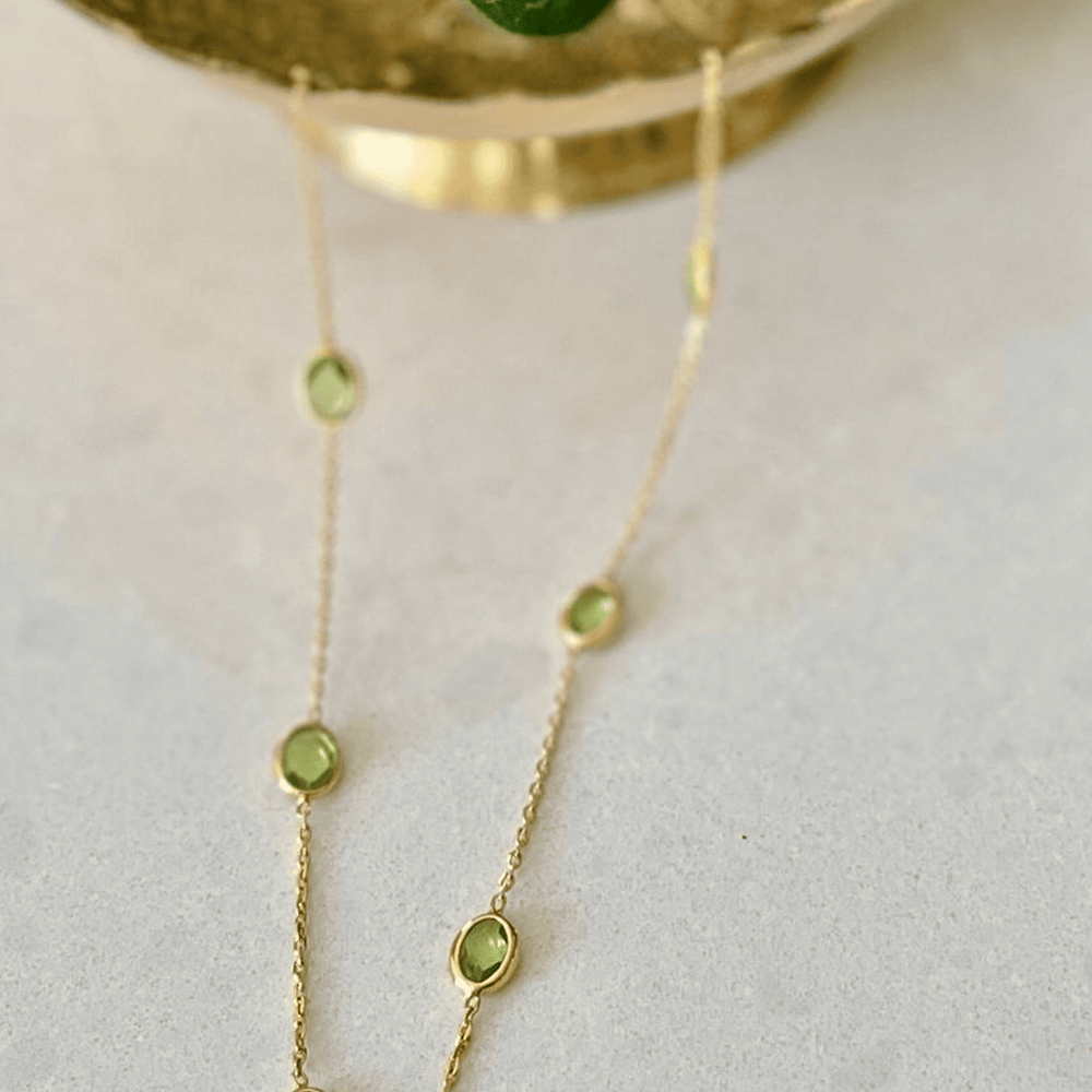 gold peridot necklace