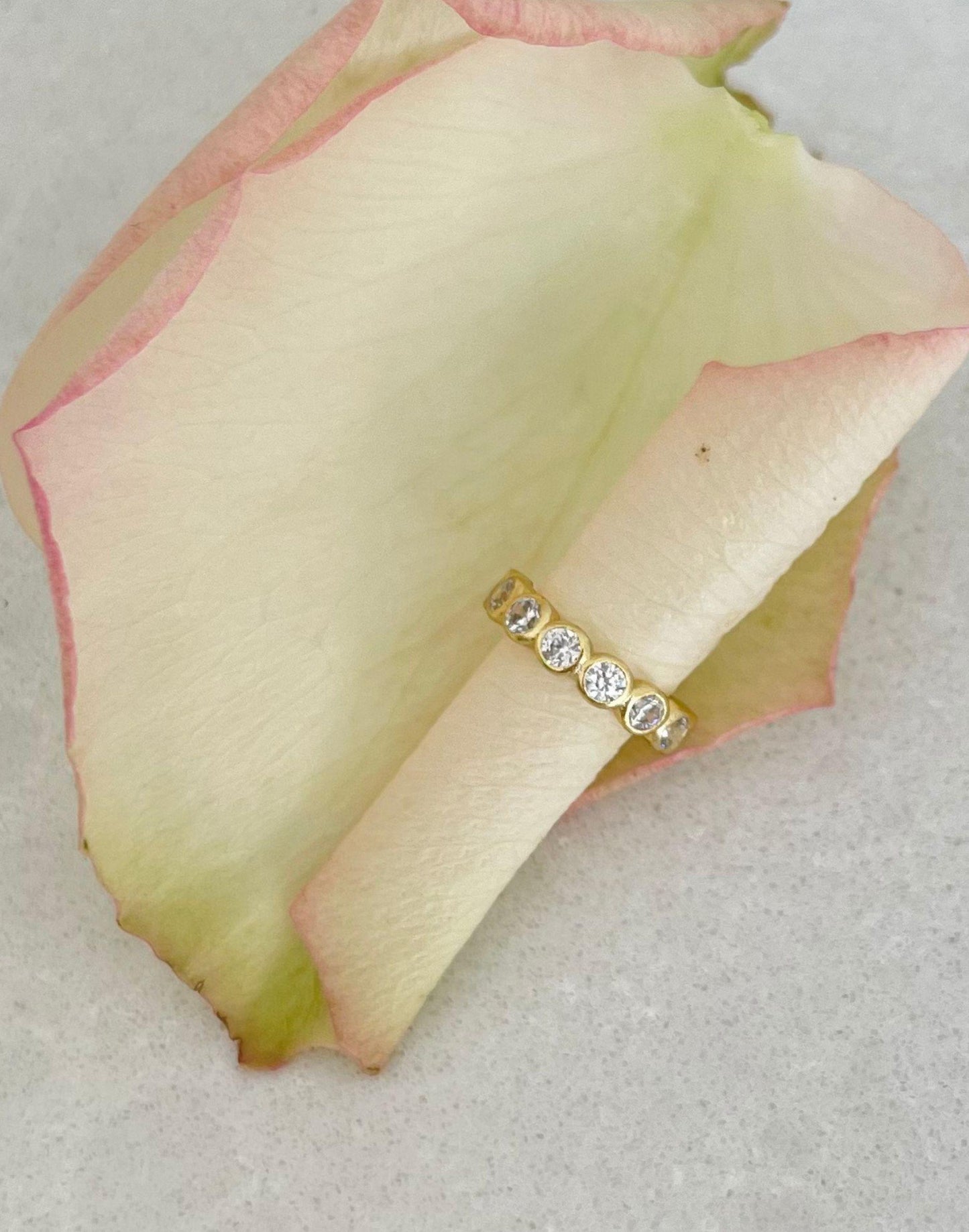 Gold CZ ear cuff on petal