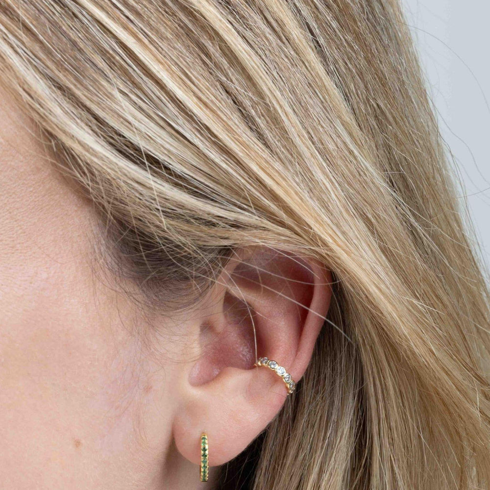 
                  
                    Gold CZ ear cuff on model
                  
                