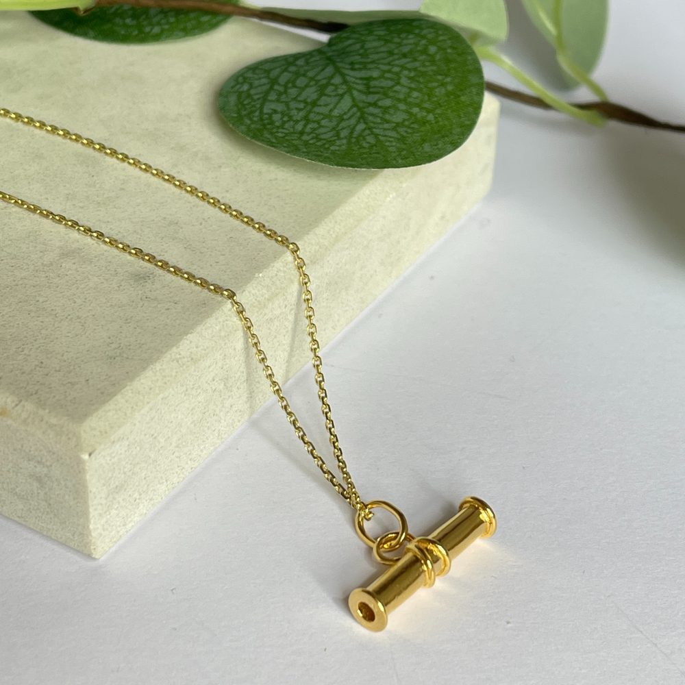 Gold T bar necklace