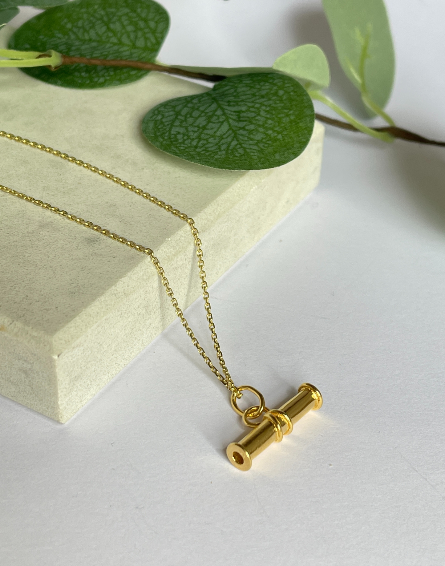 Gold T bar necklace