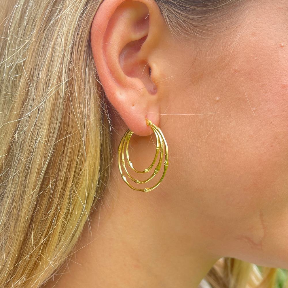 
                  
                    gold multi ring hoops
                  
                