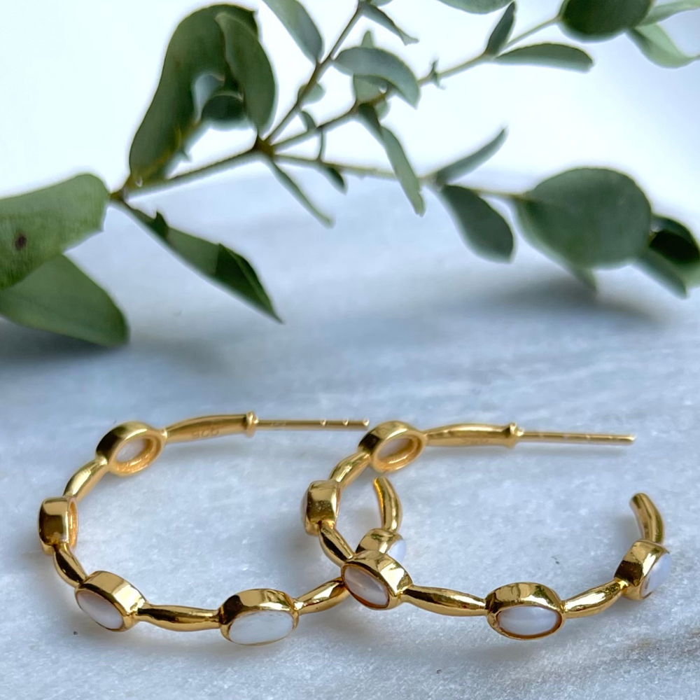 
                  
                    gold pearl hoops
                  
                