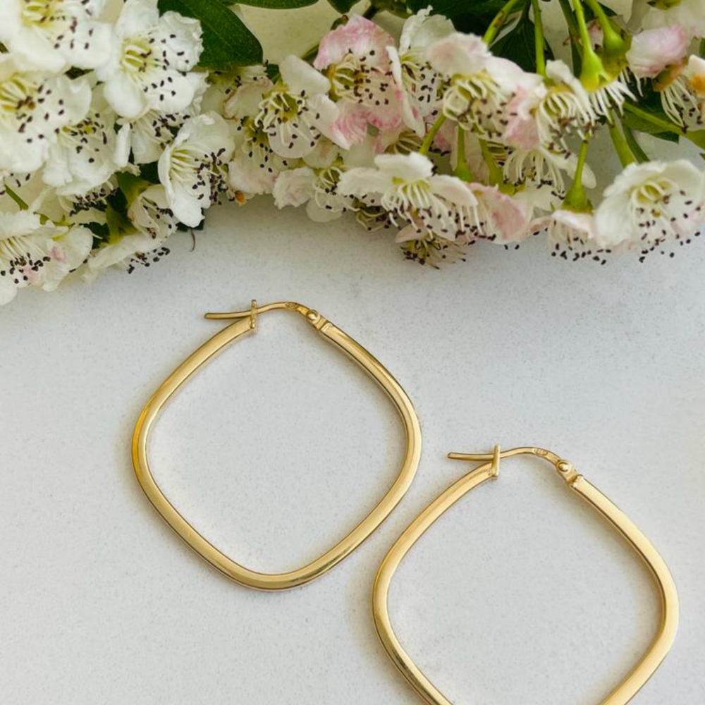 
                  
                    gold square hoops with flowers
                  
                