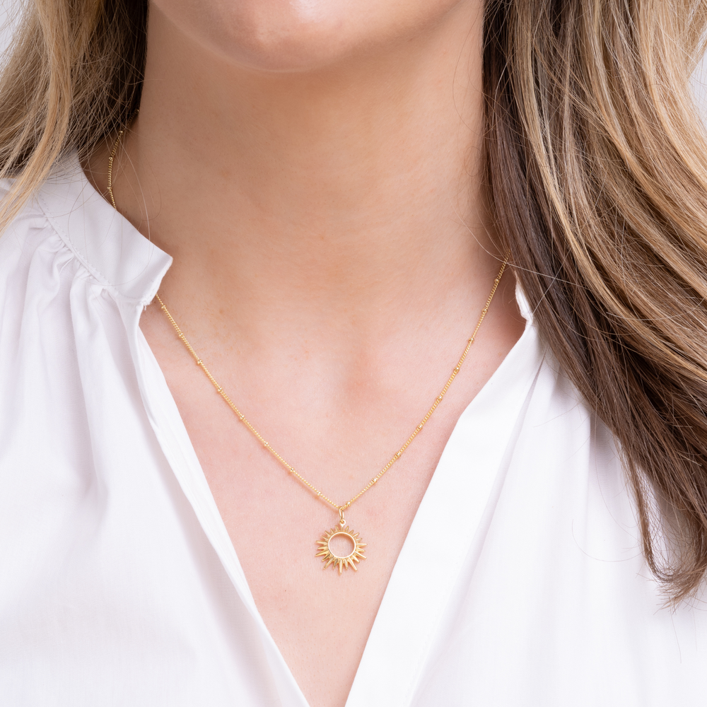 gold sunburst necklace