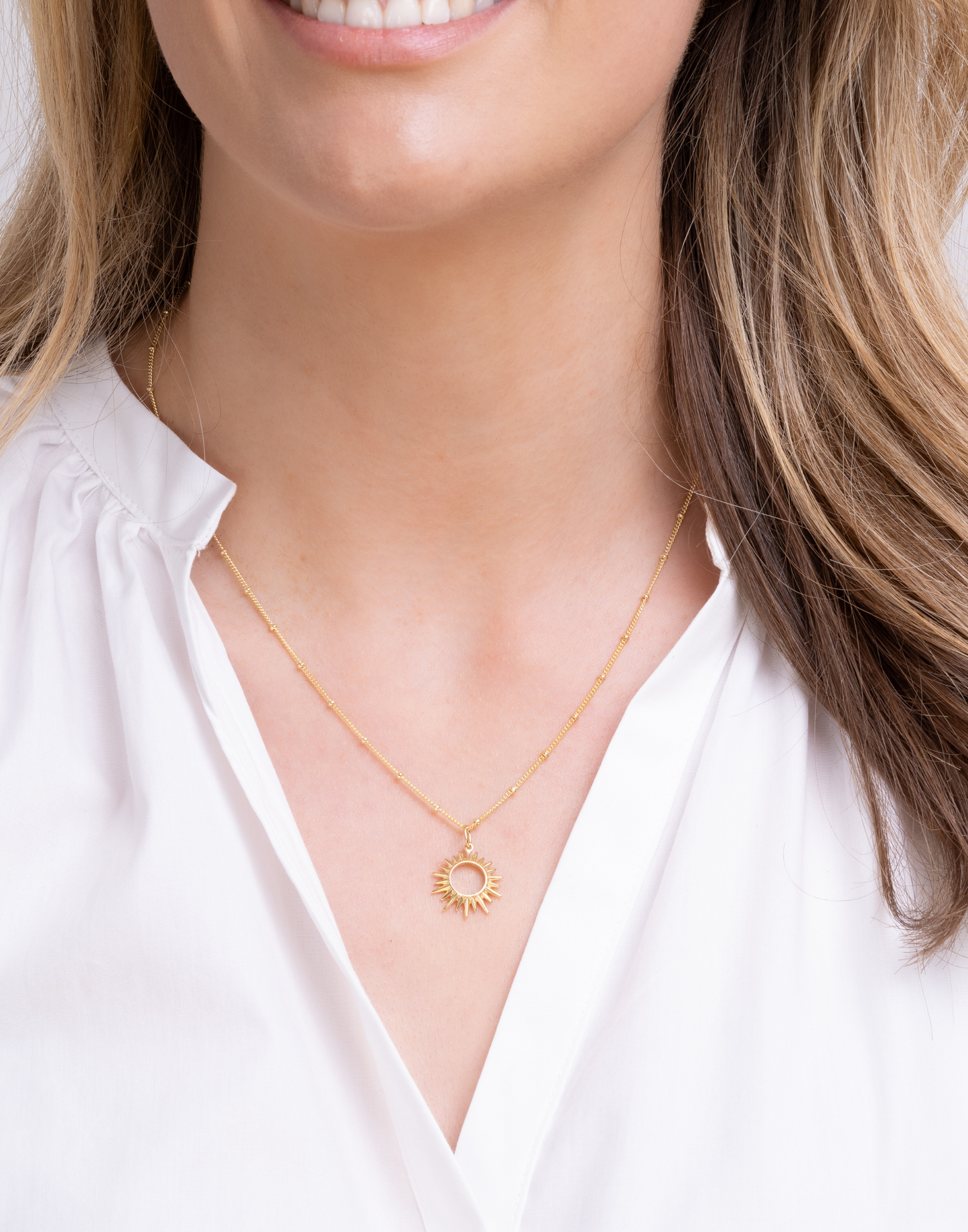 gold sunburst necklace