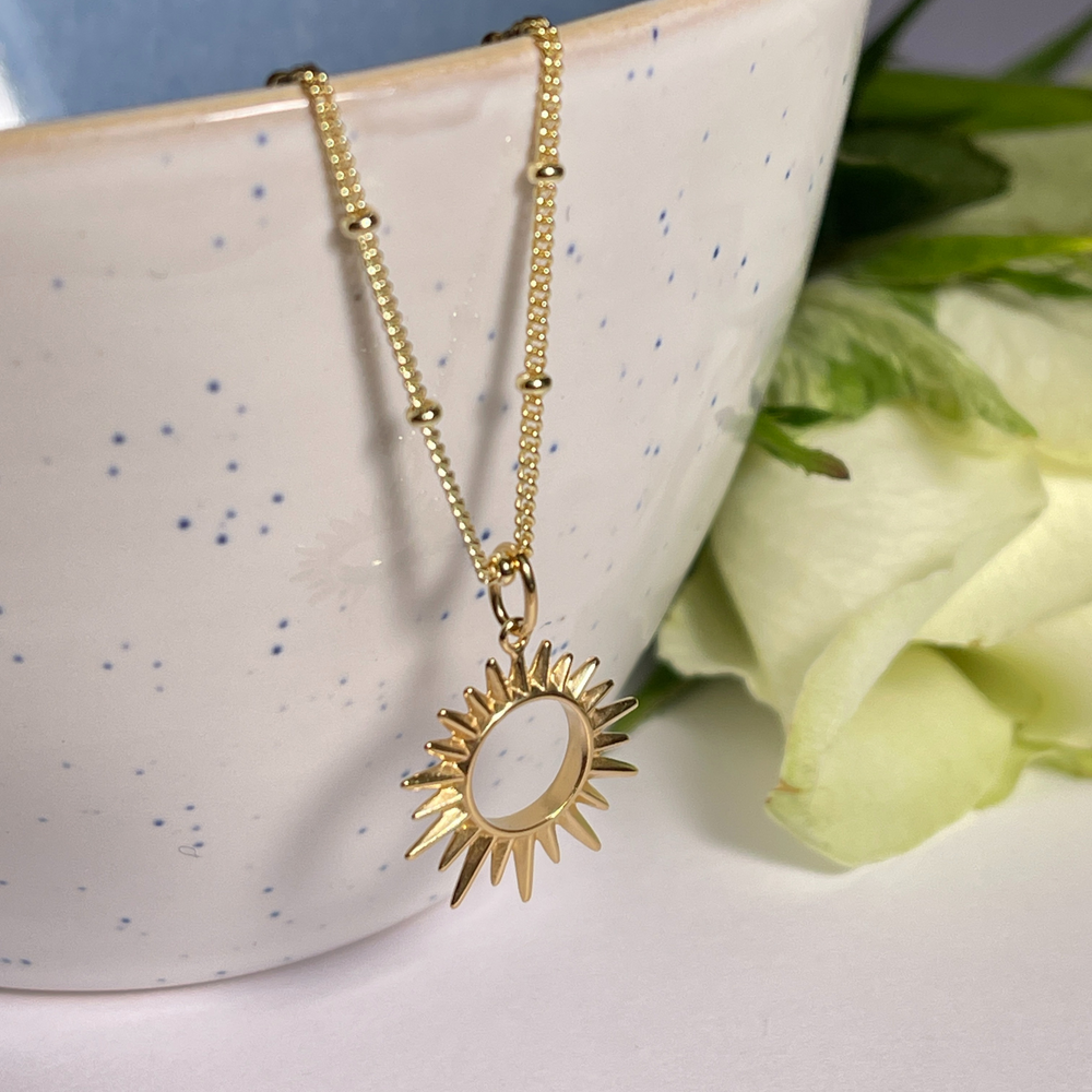 gold sunburst necklace