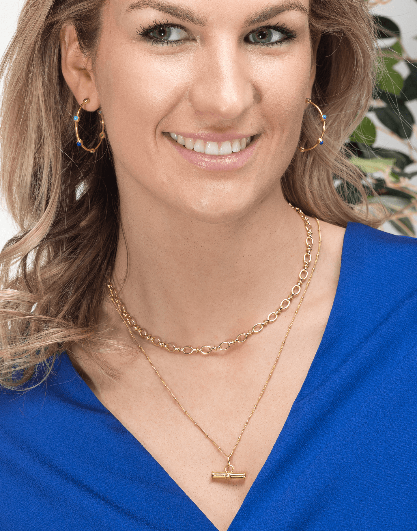 Gold T Bar necklace layered with gold chain 