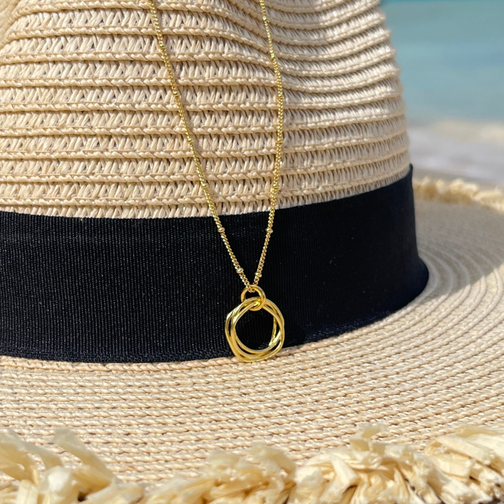 gold twisted circle necklace