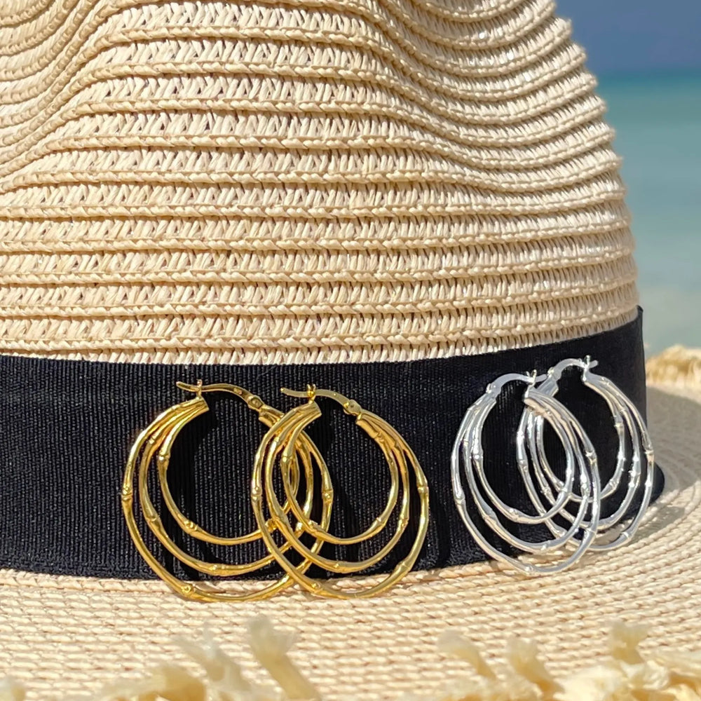 
                  
                    Gold and silver multi ring hoops
                  
                