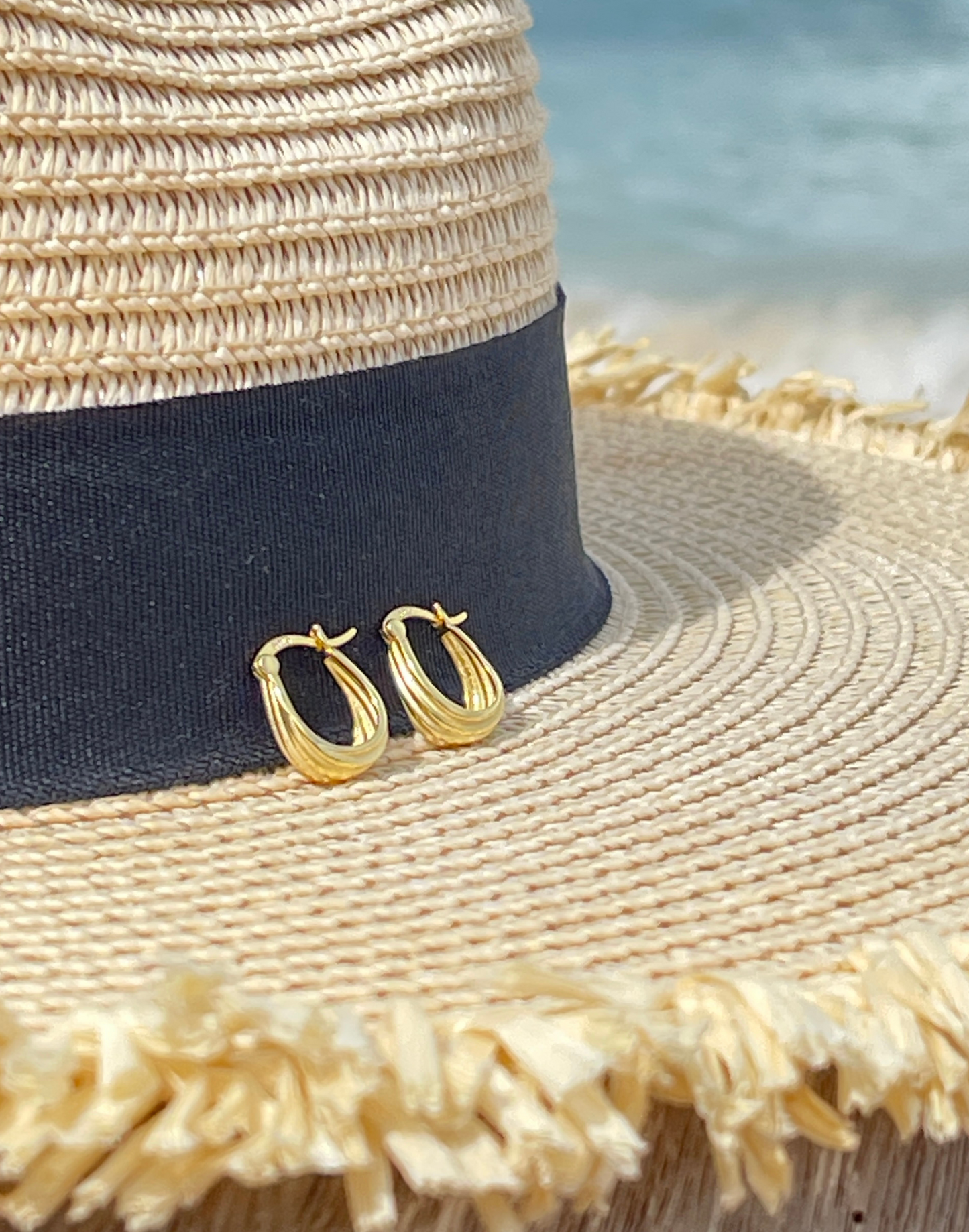 Grooved Gold Hoops on hat