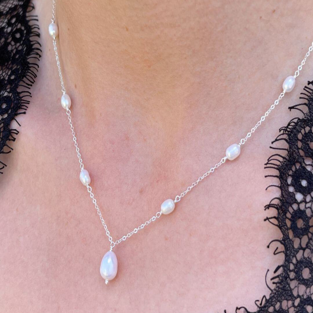 Helena silver and pearl drop necklace on model