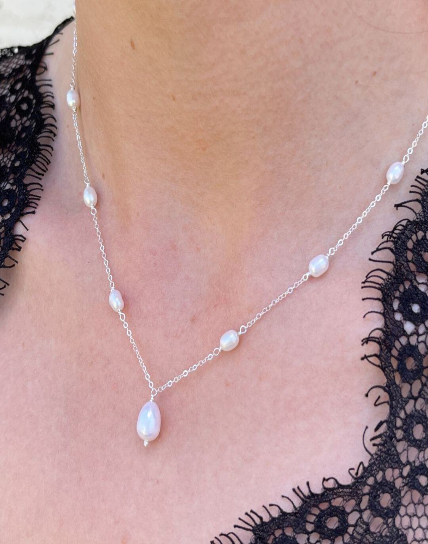 Helena silver and pearl drop necklace on model