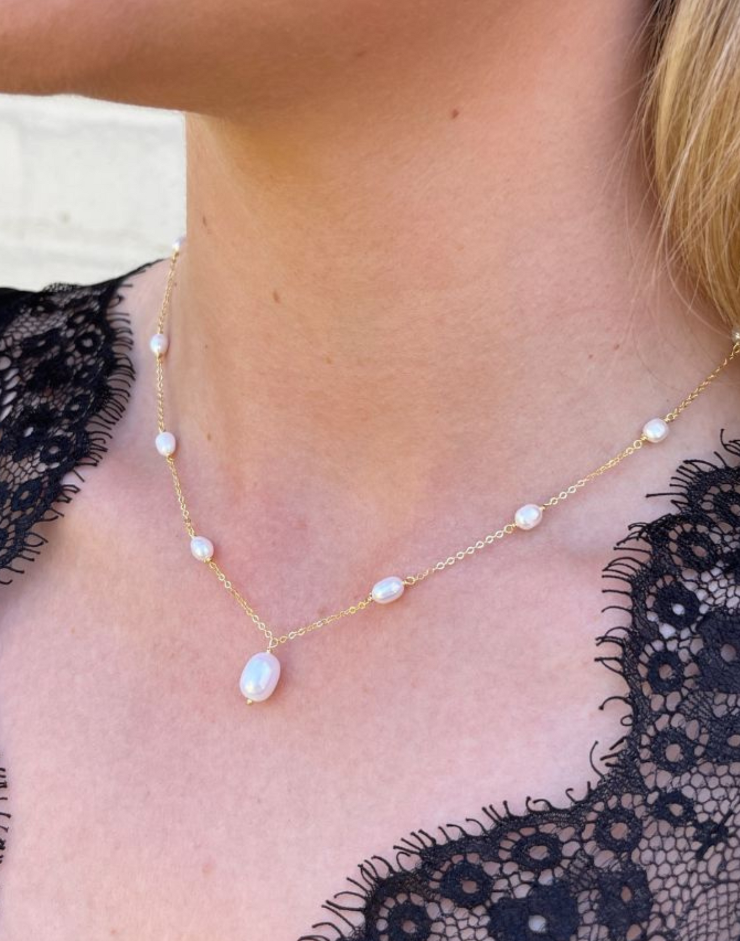 Model wears Helena Gold and Pearl Drop Necklace