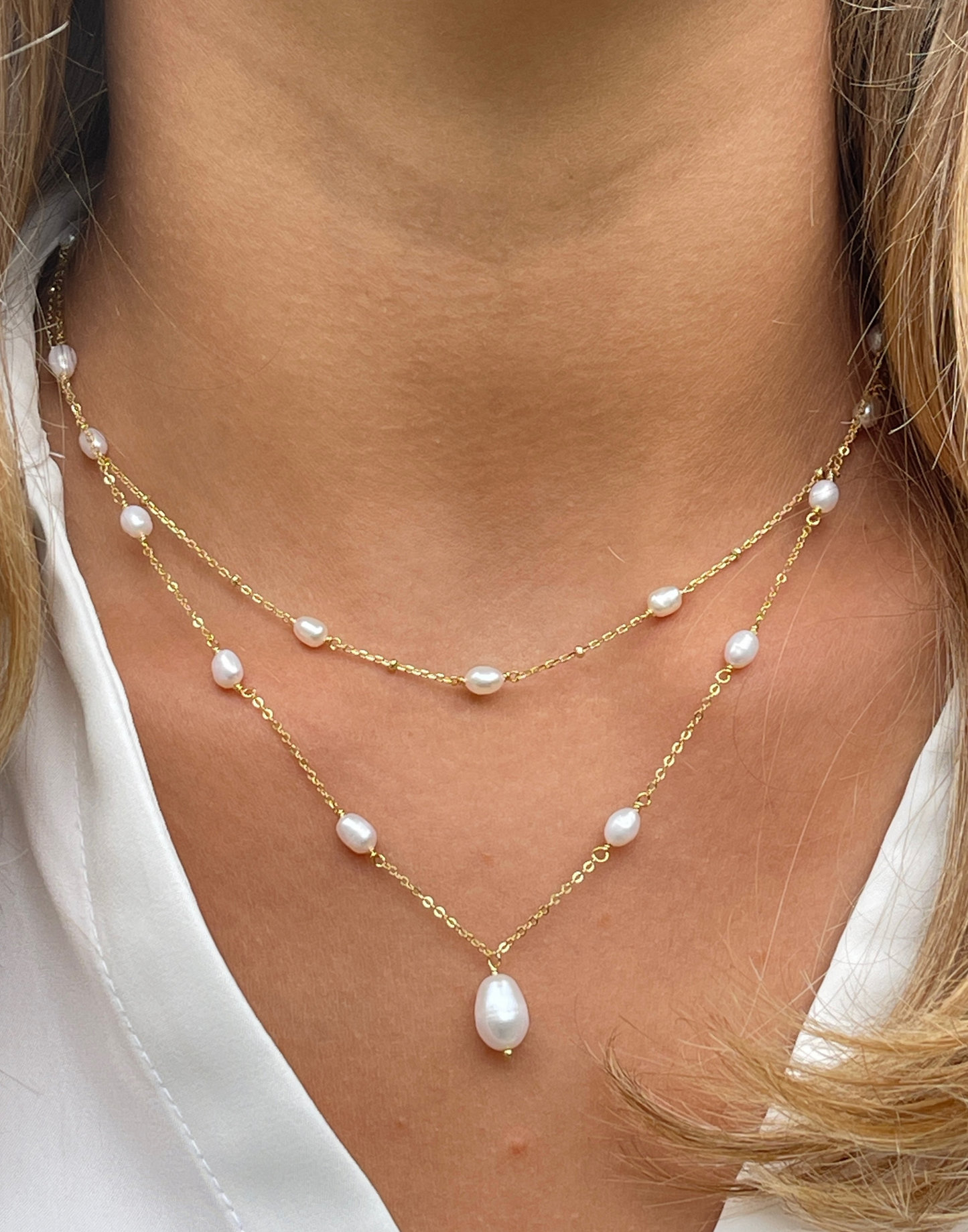 model wearing gold Helena Pearl Necklace Set