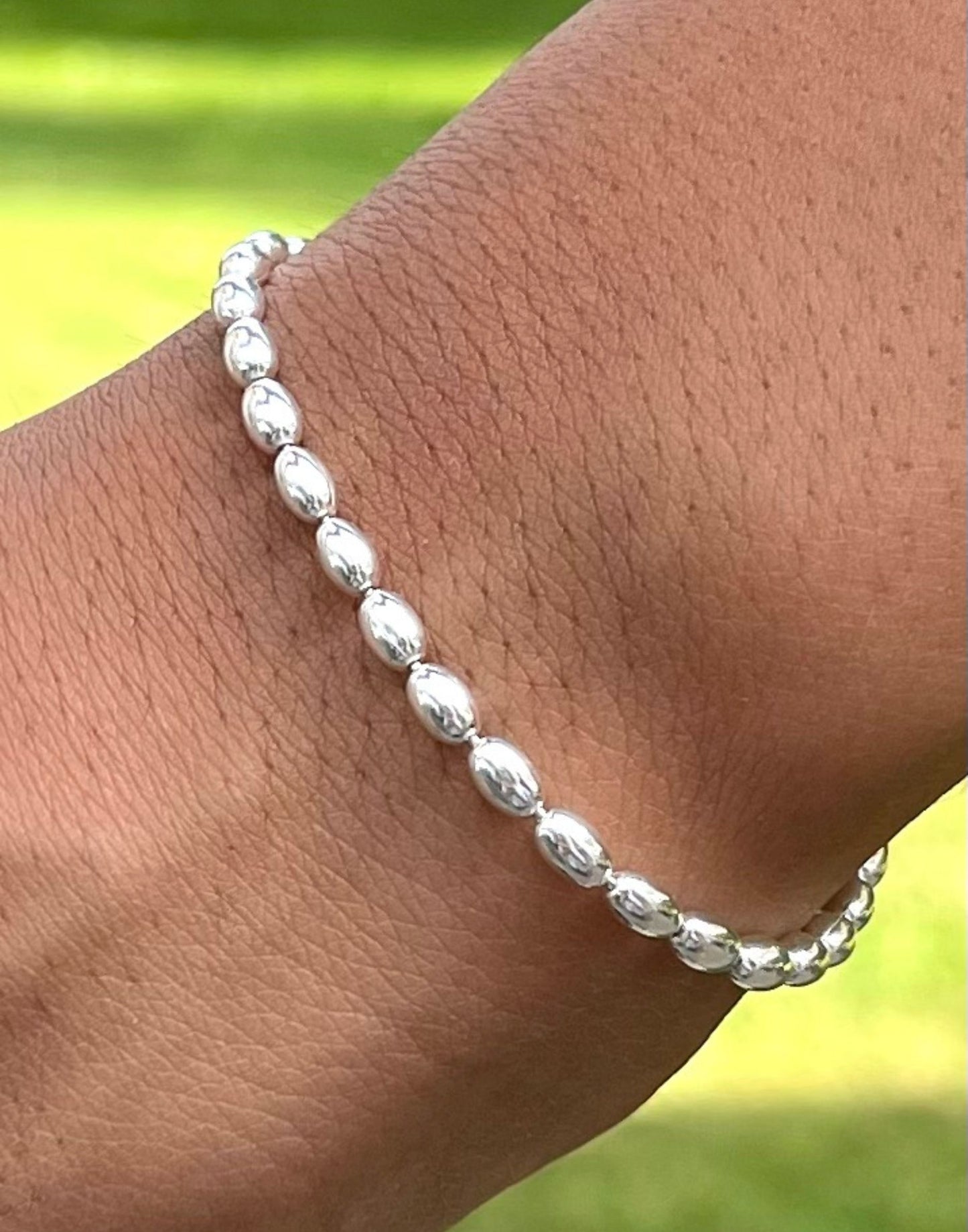 Silver Bead Jilly Bracelet close up on a wrist