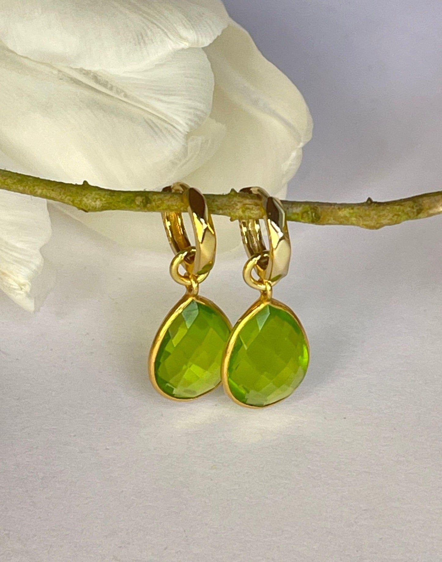 Kiera Green Verde Drop Earrings with a flower
