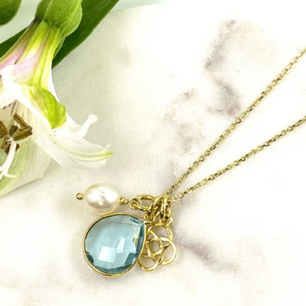 Blue topaz charm necklace with interchangeable charms