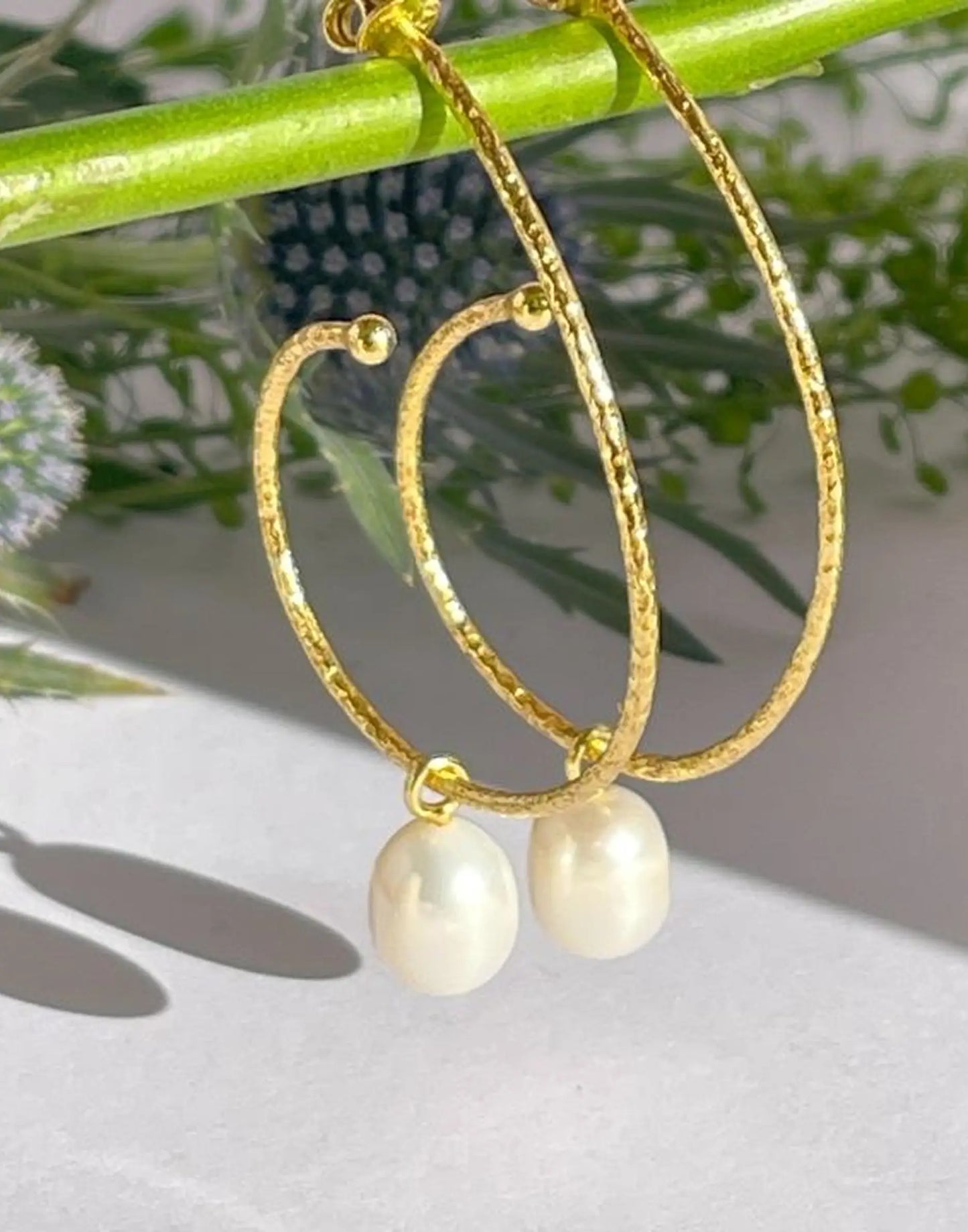 Large gold hoop with pearl drop