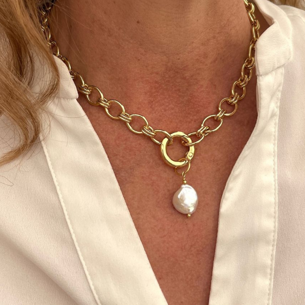 
                  
                    lizzy gold link necklace on model
                  
                