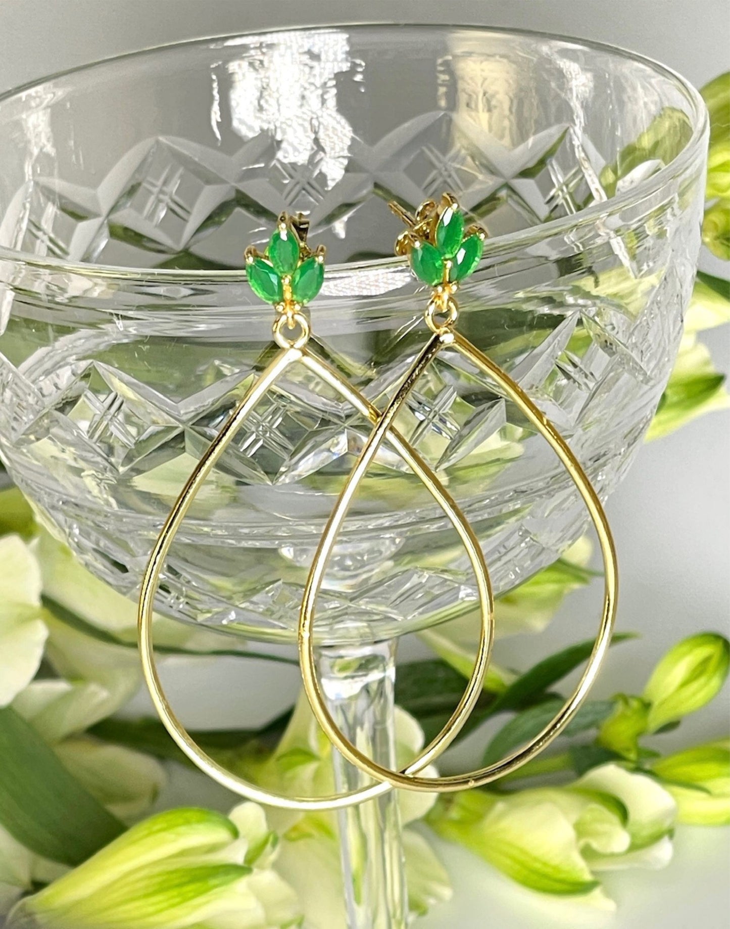 Lotus flower green onyx gold earrings on glass