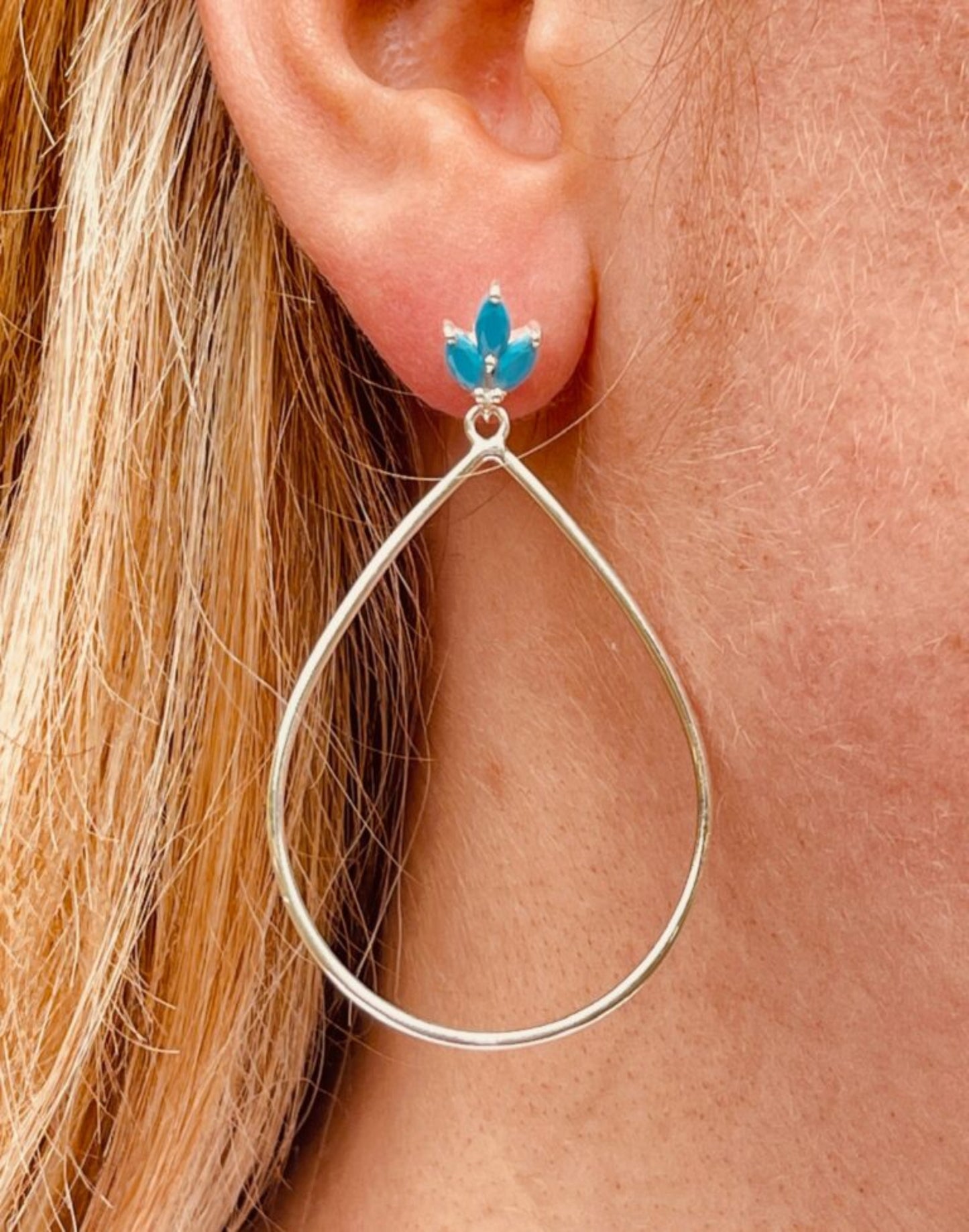 Lotus flower silver turquoise drop earrings in ear