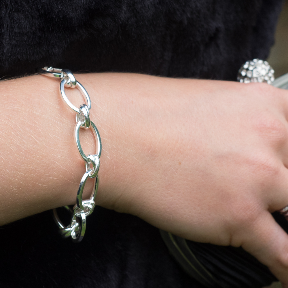 Model wears Lulu Silver Link Bracelet
