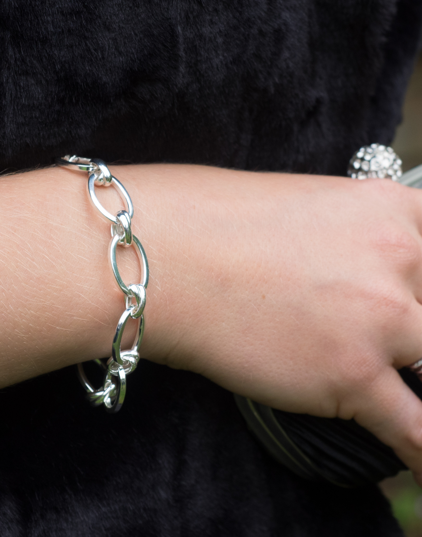 Model wears Lulu Silver Link Bracelet