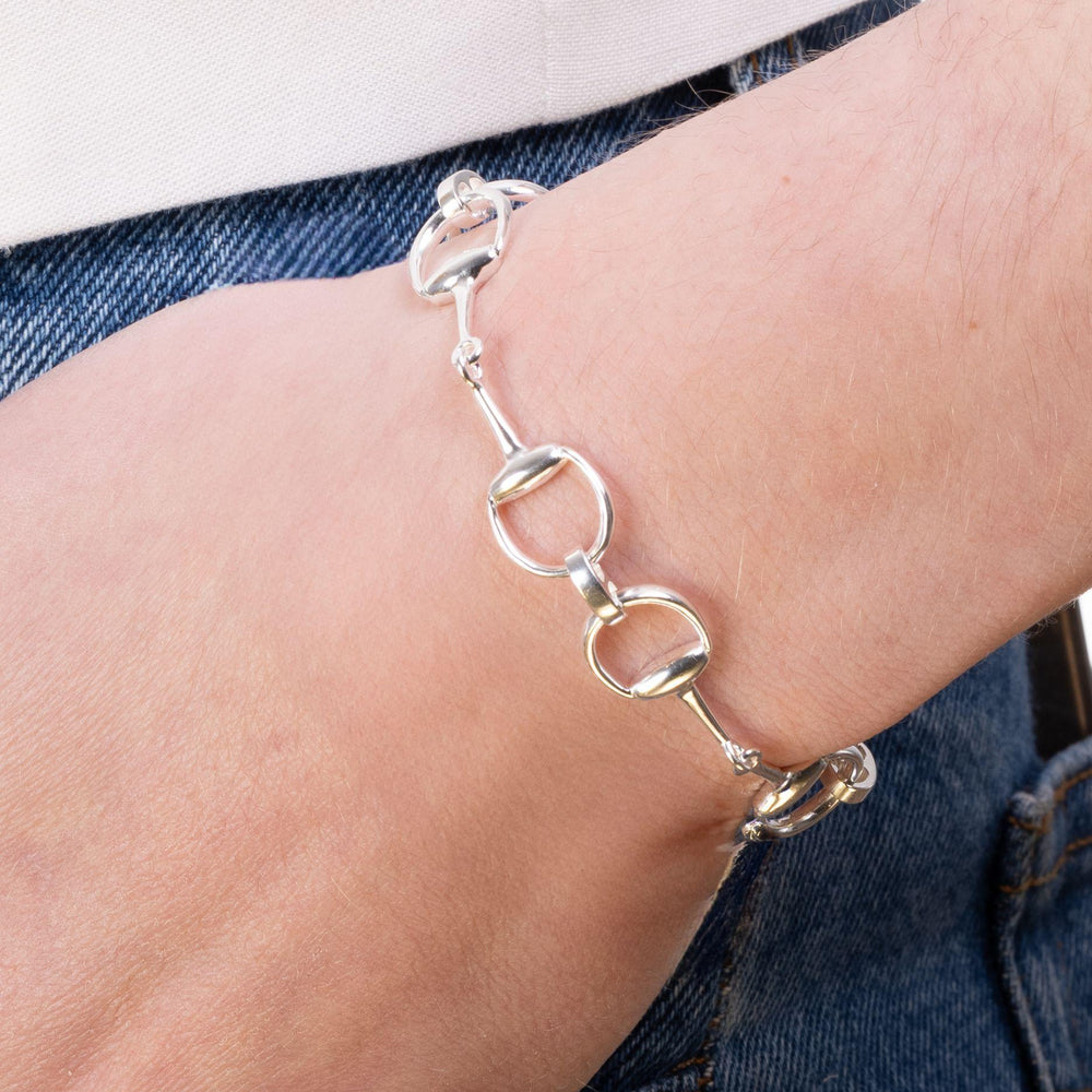 Model wears mid silver snaffle bracelet