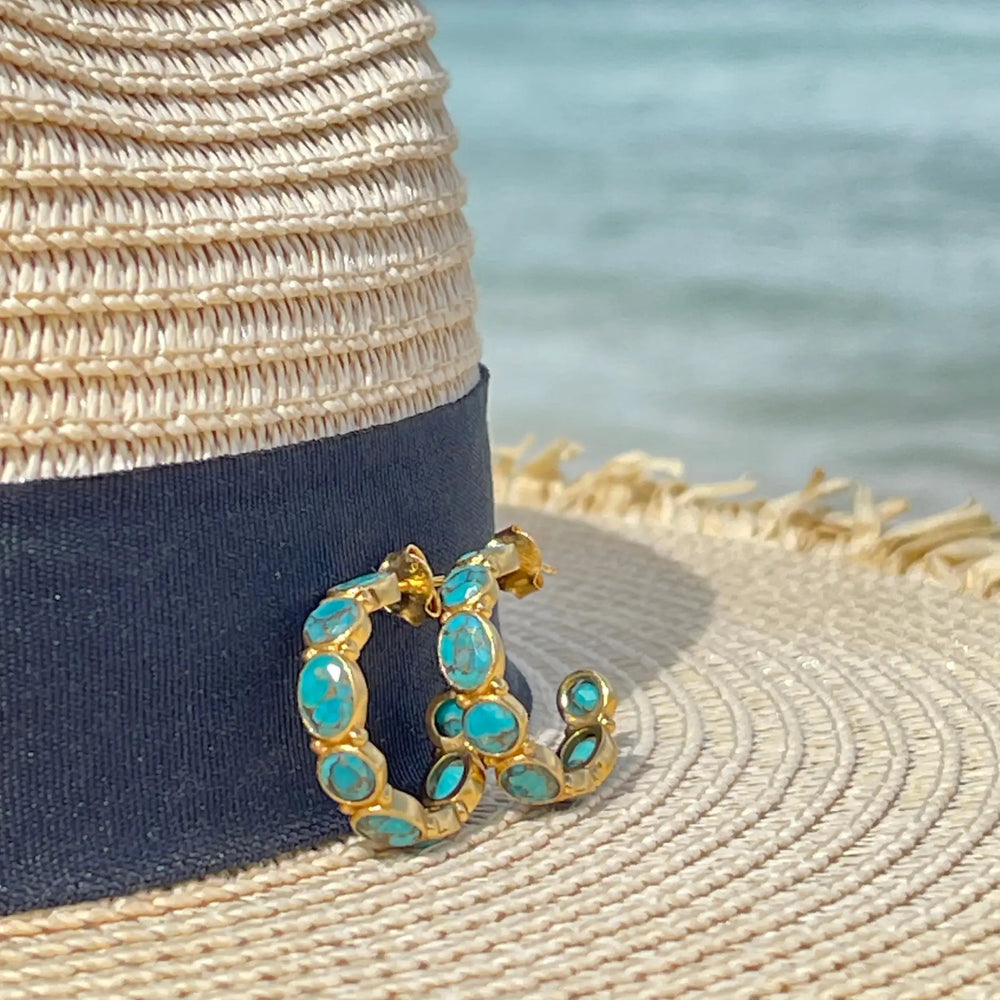 Mojave hoop earrings on hat