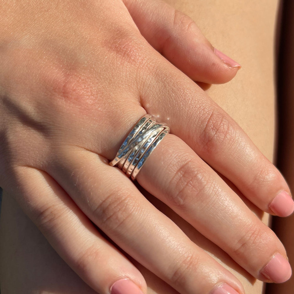 Model wears Multi band silver ring