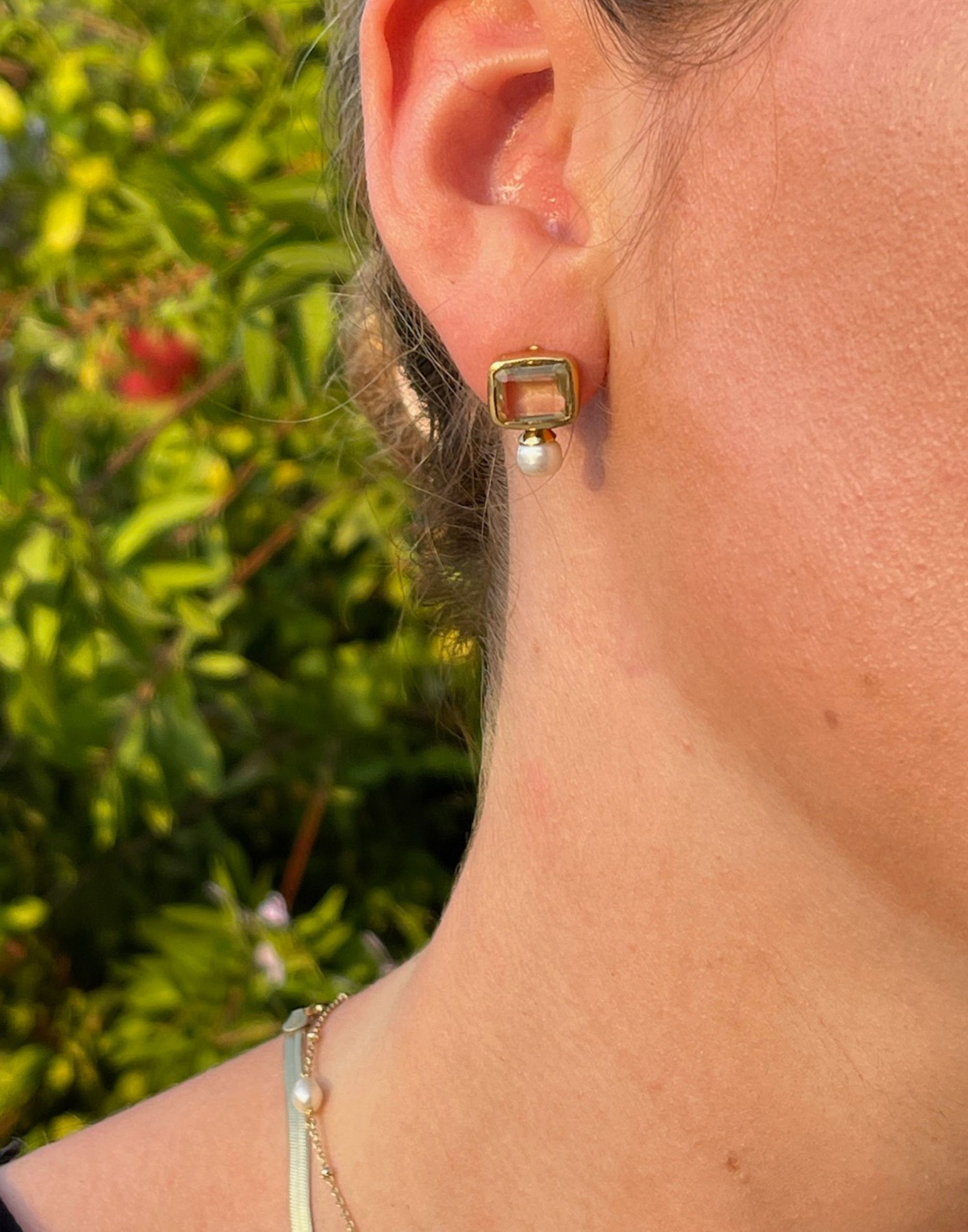 pearl and lemon quartz stud earrings on model