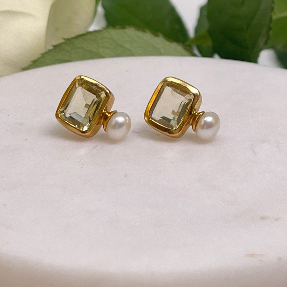 pearl and lemon quartz stud earrings on tile