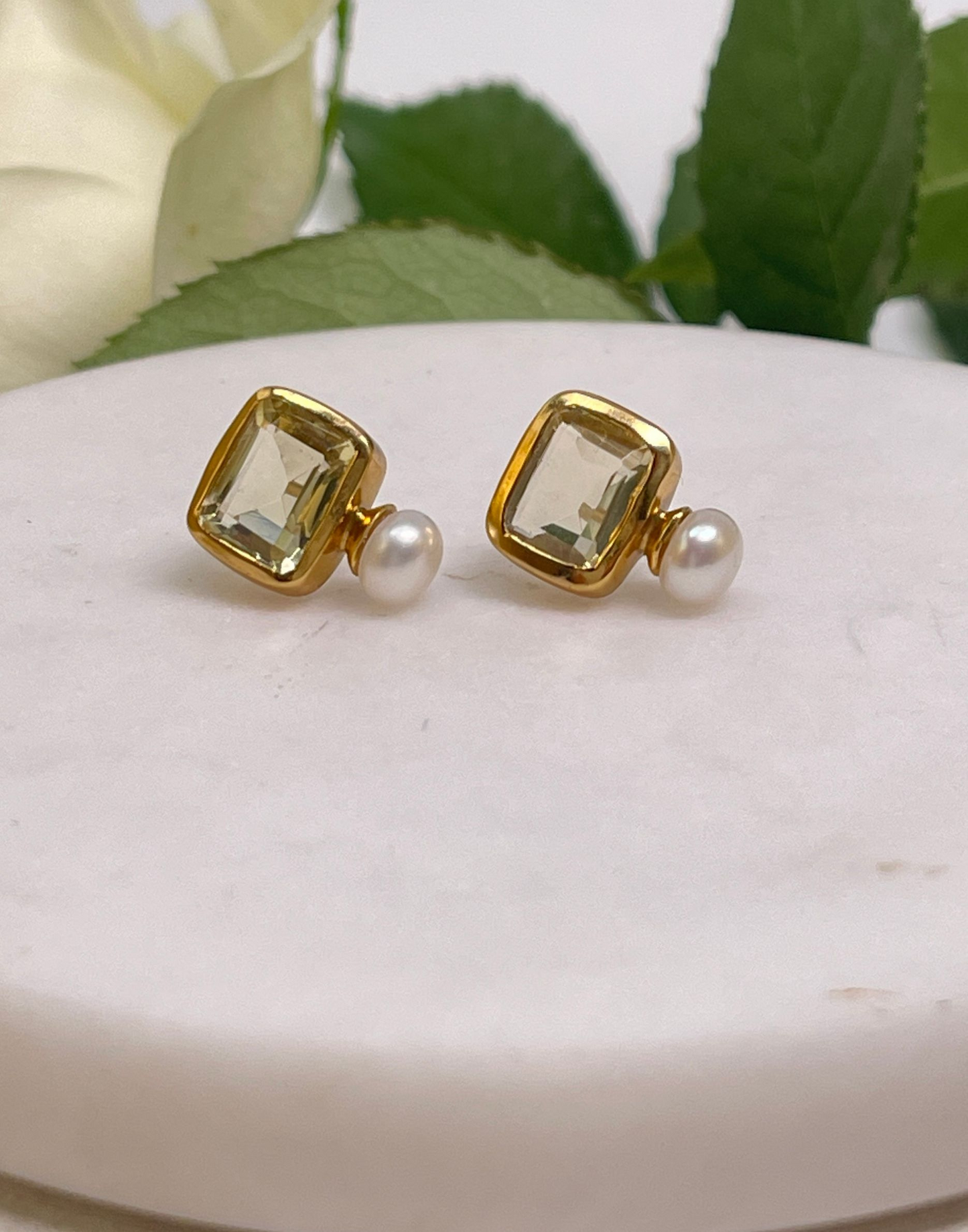 pearl and lemon quartz stud earrings on tile