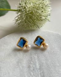 Pearl and navy stone stud earrings in gold plated silver