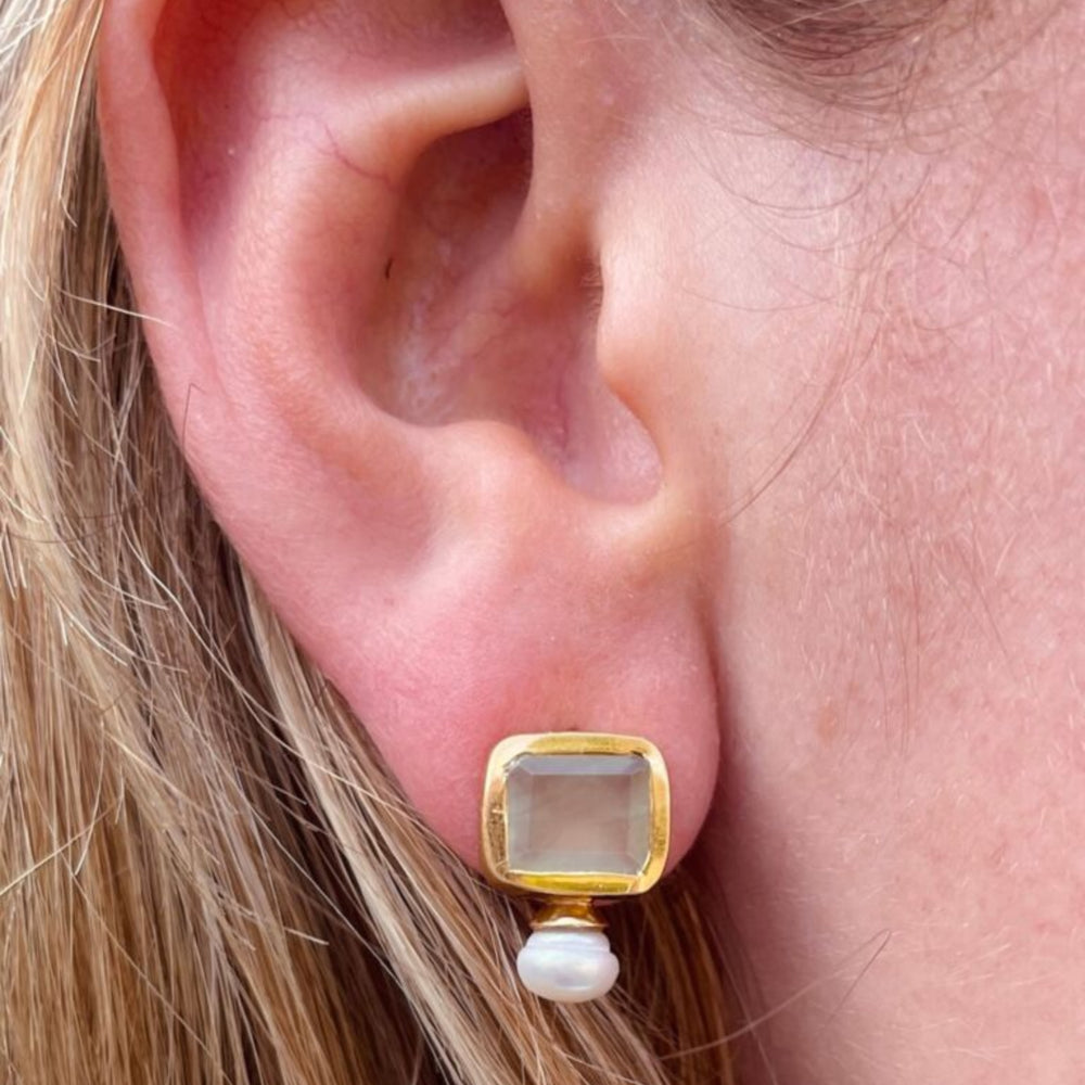 
                  
                    Pearl and Prehnite stud earrings in ear
                  
                