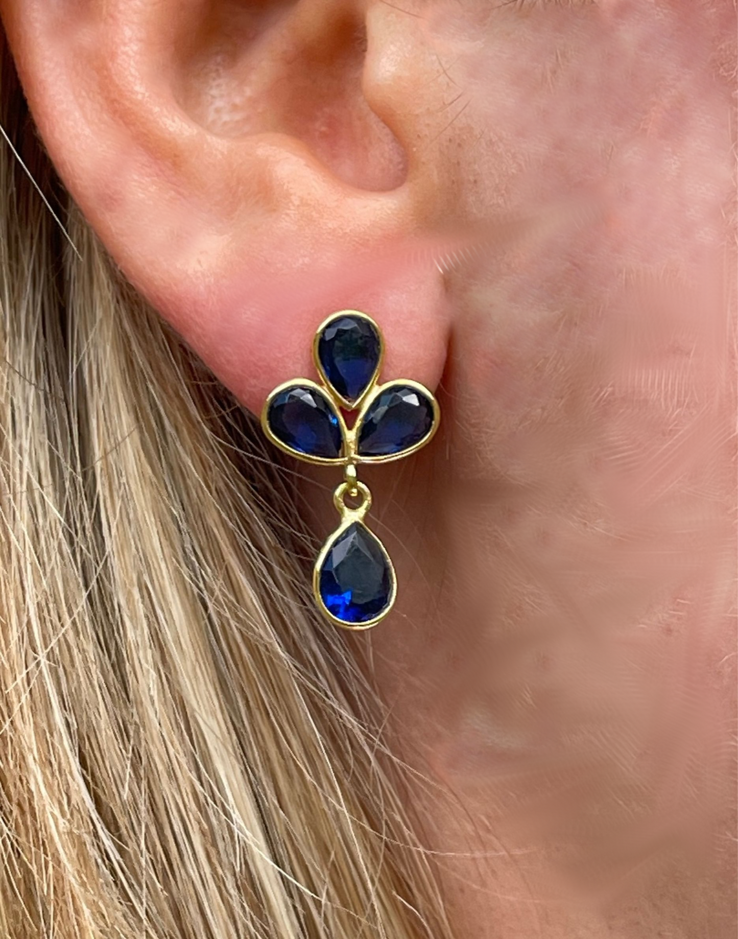 Petal Dark Blue Topaz Gold Earrings on model