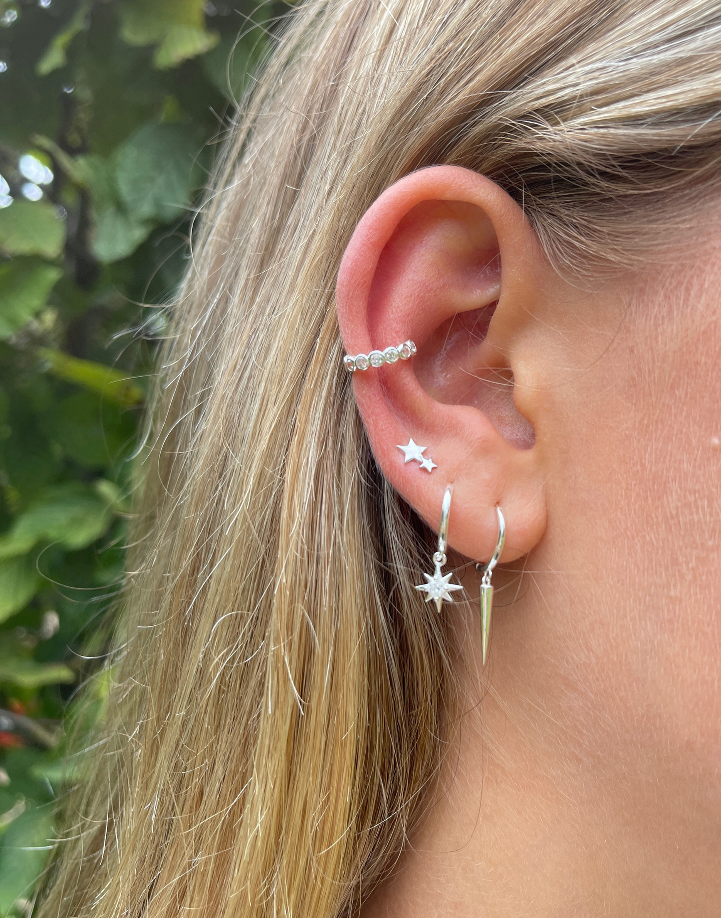 model wears silver cubic zirconia ear cuff