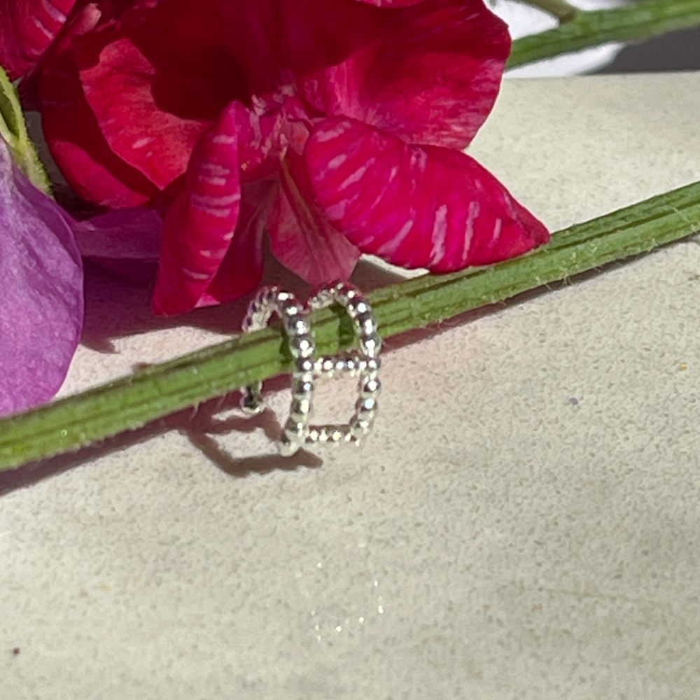 
                  
                    silver double row bobble ear cuff
                  
                