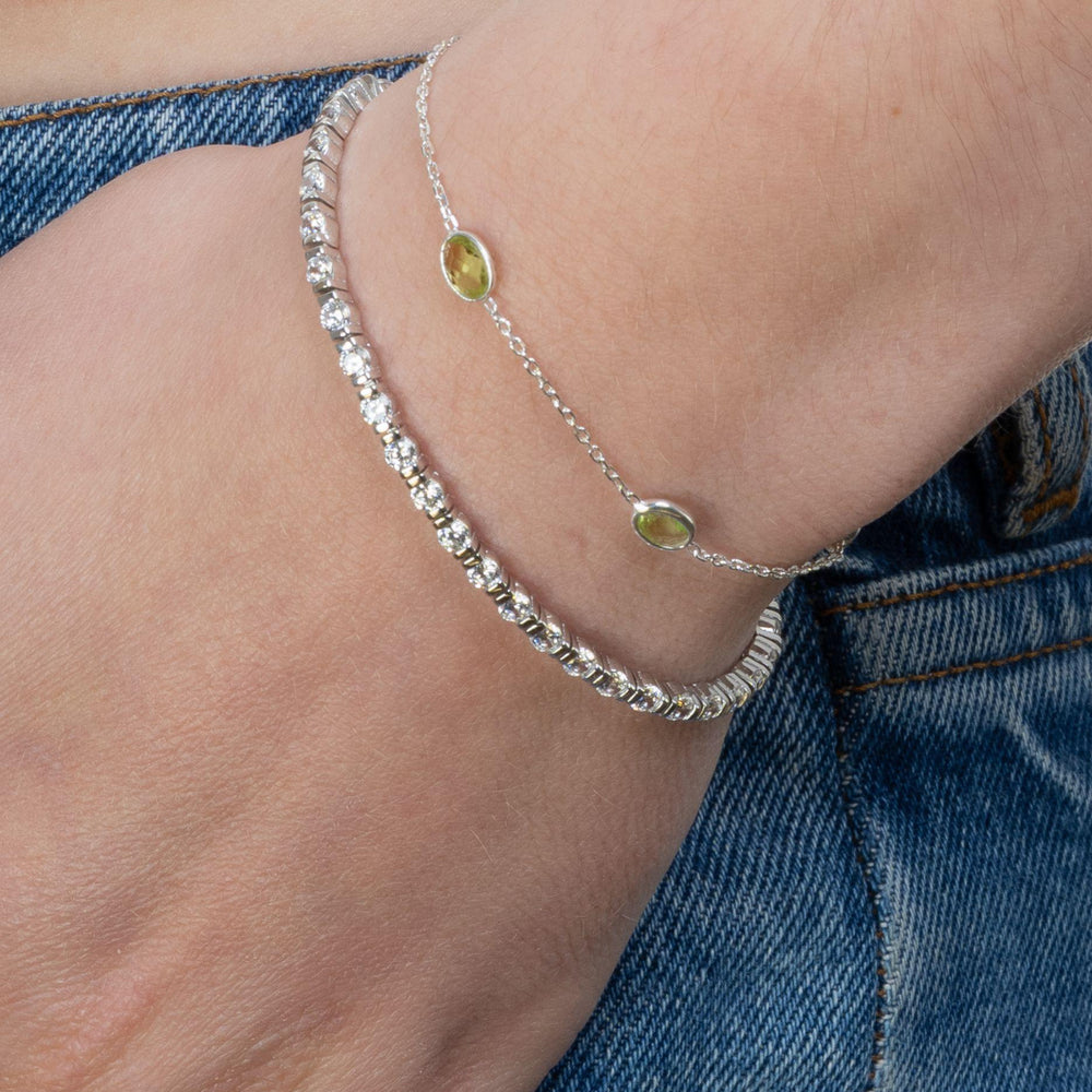 
                  
                    Silver Peridot Bracelet stacked with Tia Tennis Bracelet
                  
                