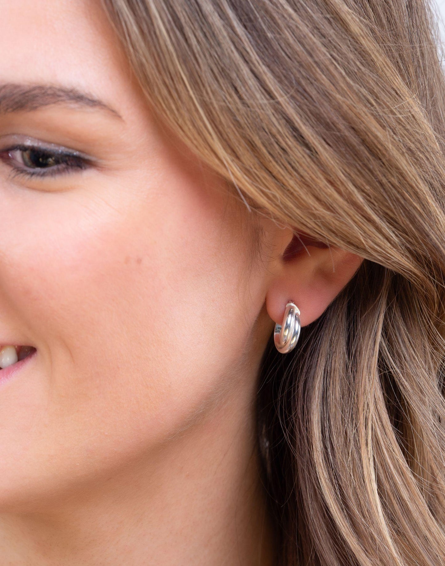 Model wears russian ring earrings