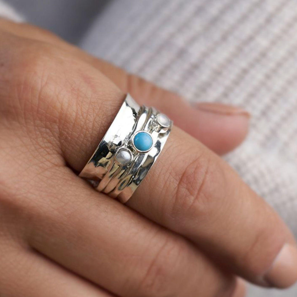 Model wears Silver Spinning Ring