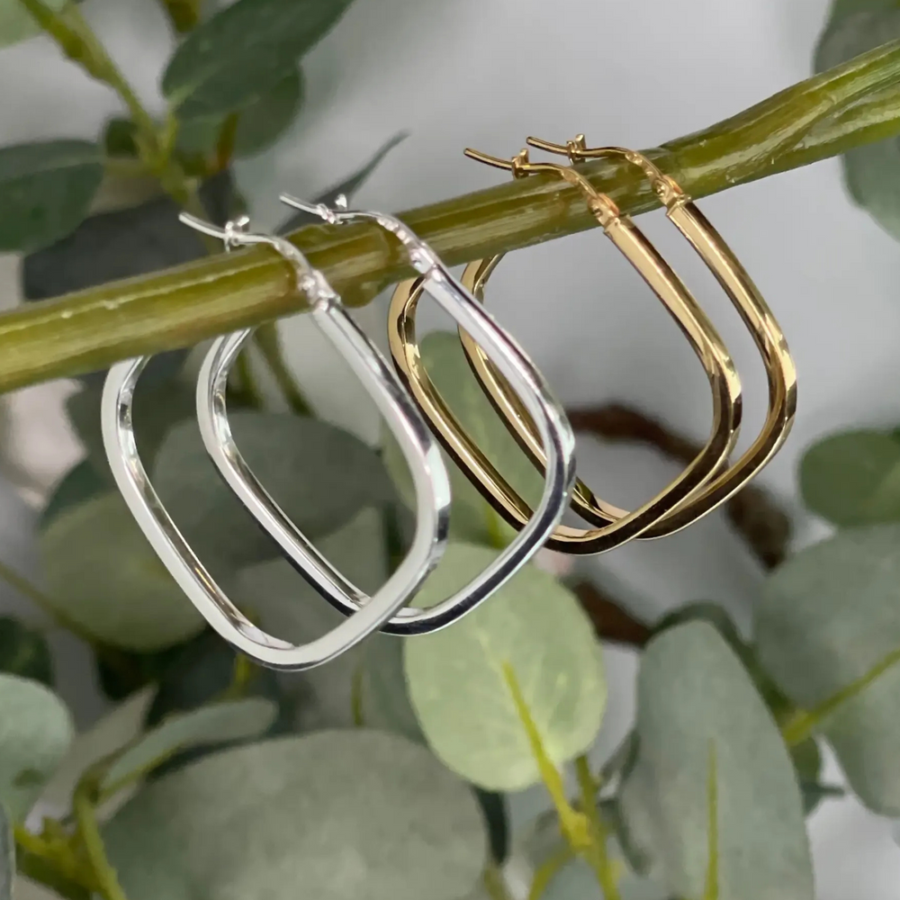 
                  
                    Silver and gold square hoop earrings
                  
                